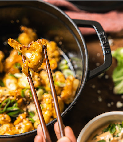 cauliflower cooked in cast iron pot